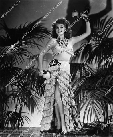 Rita Hayworth shaking her maracas 2308-13