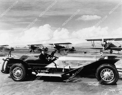 Ralph Forbes in 1929 Mercedes automobile drives to the airport 2326-06