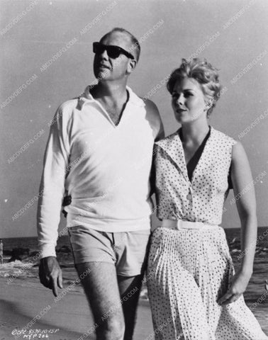 candid Kim Novak Richard Quinne strolling on the beach 2412-34