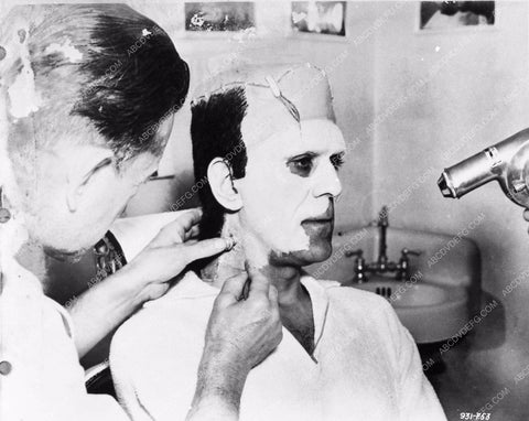 Jack Pierce applying Boris Karloff's Frankenstein makeup behind the sc 2706-28
