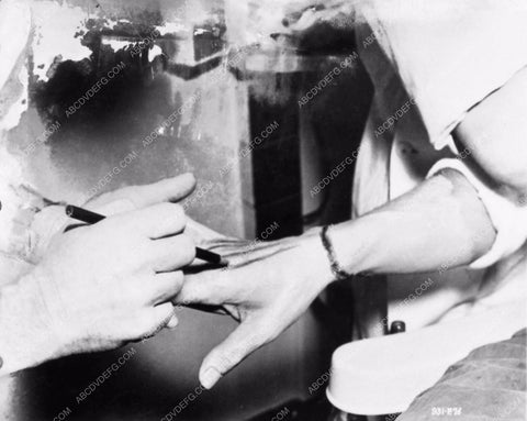 Jack Pierce applying Bela Lugosi's igor beard for son of frankenstein 2707-11