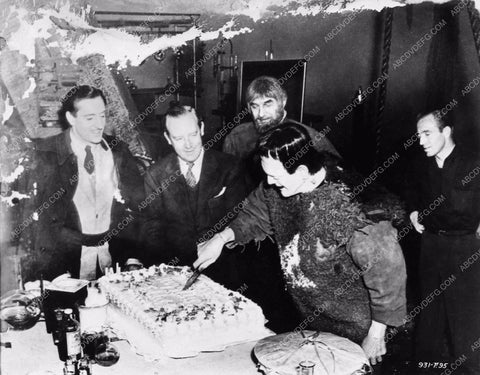 Rowland V. Lee, Basil Rathbone, enjoy Boris Karloff's birthday cake 2707-24