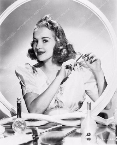 Betty Grable portrait at her makeup table 2719-20