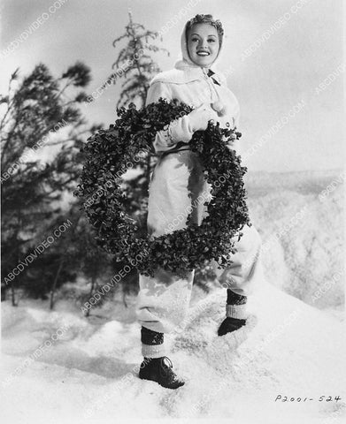 Betty Grable goes in the snow and retrieves her Christmas wreath 3030-08