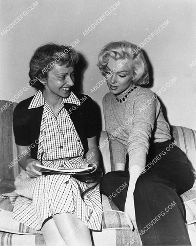 candid Marilyn Monroe going over the script 3084-32