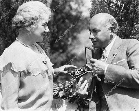 Cecil B Demille and wife w some medal 3202-36
