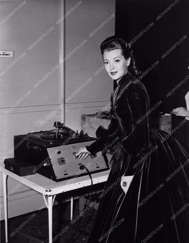 Lana Turner behind the scenes playing records Green Dolphin Street 3212-25