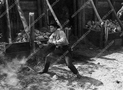 Allan Lane and six shooter in action film Sundown in Santa Fe 3262-13