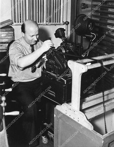 historic Hollywood MGM's editor Oskar Fischinger looking at some film 3364-15