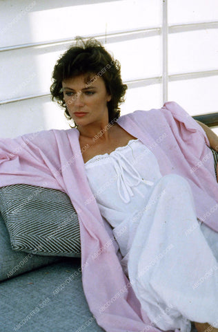 beautiful Jacqueline Bisset relaxing on sofa 35m-827