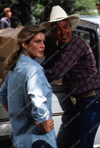 Priscilla Presley loading up the truck TV Dallas 35m-10961