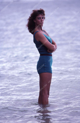 Rachel Ward wading in the surf 35m-13269