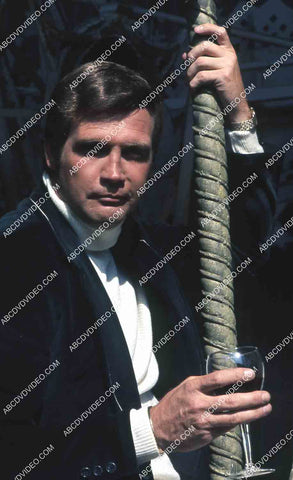 Lee Majors on a carousel horse w glass of wine TV The Six Million Dollar Man 35m-14212