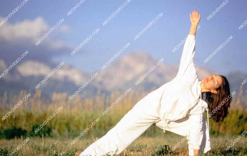 lady does stretching and yoga in mountains Discovery Channel documentary TV Discovery Health 35m-15926
