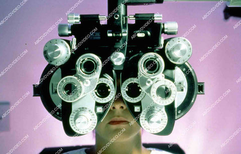 lady behind cool optometry machine to check eyeballs Discovery Channel Health documentary 35m-15928