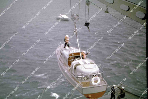 circa 1956 U.S. Naval operations USS Shangri-La raising launch to load up 35m-16586