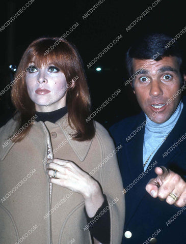 candid Tina Louise & Les Crane arrive at some event 35m-16855