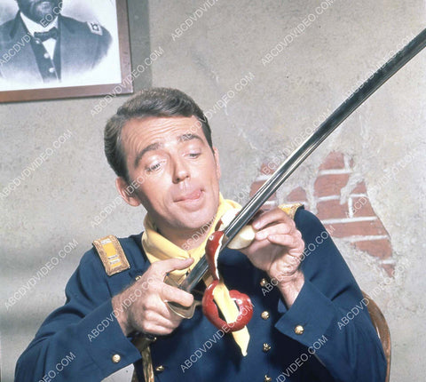 Ken Berry peeling an apple in a most dangerous way TV F Troop 35m-16977
