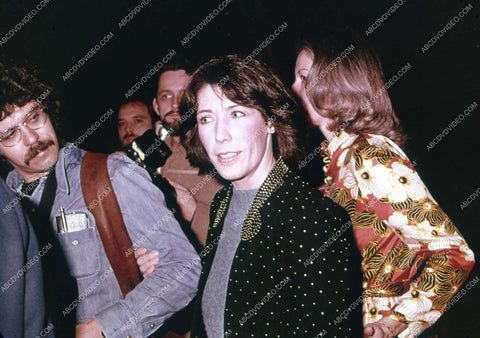 Lily Tomlin and date arriving at some event 35m-17130