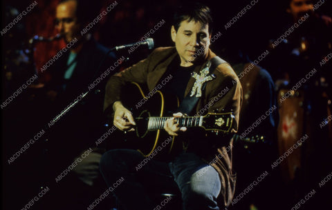 musician Paul Simon and guitar on MTV 35m-1868