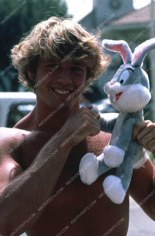 shirtless John Schneider w Bugs Bunny doll on set TV Dukes of Hazzard 35m-1901