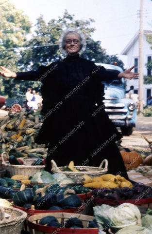 Bette Davis and baskets of gourds 35m-2742