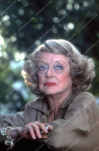 Bette Davis smoking a cigarette outdoors 35m-2756