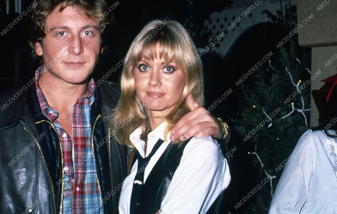 Olivia Newton-John & husband Lee Kramer candid 35m-5509