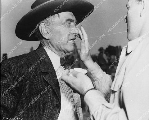 candid Harry Carey gets makeup touch up on set film Duel in the Sun 3839-10