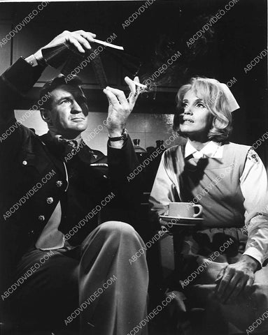 candid Rod Taylor Eva Marie Saint look at negatives on set film 36 Hours 3839-25