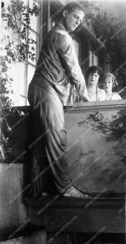 Reginald Denny in pajamas going over the balcony silent comedy 3928-09