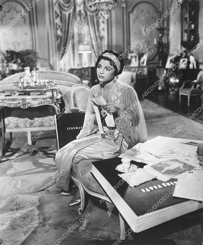 Ann Bancroft w some very large books film Tonight We Sing 4146-10