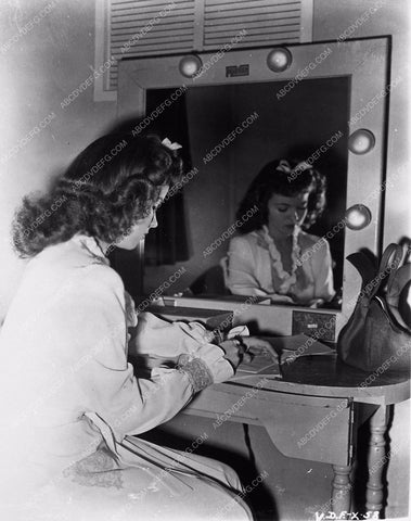 candid Shirley Temple at her makeup table mirror shot 4439-23