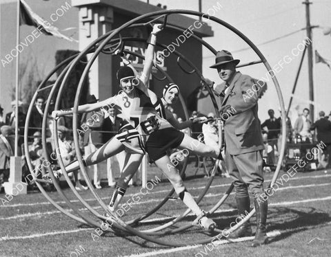 Cecil B DeMille w the athletic girls in the circus rings film Dynamite 4588-04