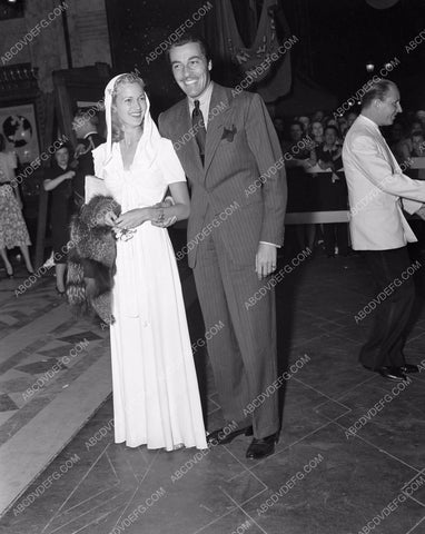 Cesar Romero and his date at Hollywood Canteen Club 45bx02-17