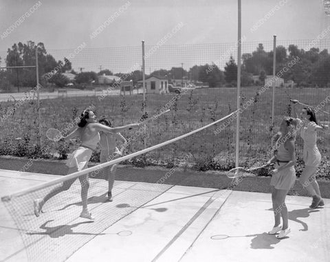 Universal Studios stunt girls playing tennis between takes 45bx02-31