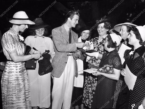 William Lundigan signs autographs at party 45bx05-27