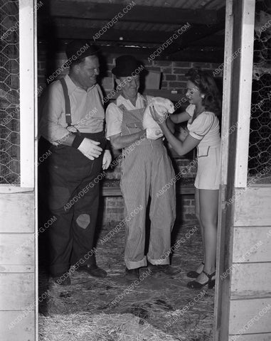 candid Stan Laurel Oliver Hardy tend garden at home in backyard 45bx08-294