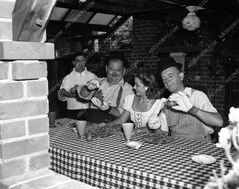candid Stan Laurel Oliver Hardy tend garden at home in backyard 45bx08-299