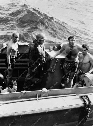 Richard Widmark and shirtless men from action film The Frogmen 4936-23
