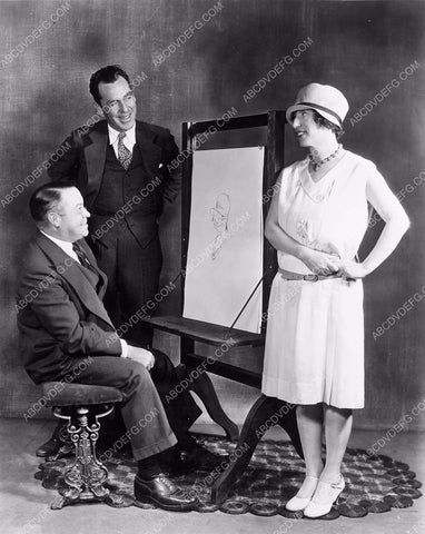 cartoonist George McManus draws silent film star Polly Moran 4b09-075