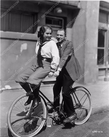 Lee Tracy and who on bicycle MGM backlot 4b09-539
