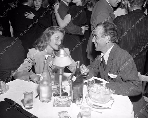 news photo candid Hollywood Humphrey Bogart Lauren Bacall out dining 4b09-564