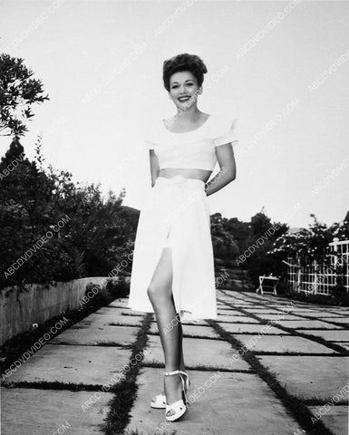 Carole Landis modeling her new swimwear in the backyard 5481-26