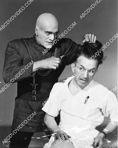 Boris Karloff turns the tables on Jack Pierce and cuts his hair off 5623a-25