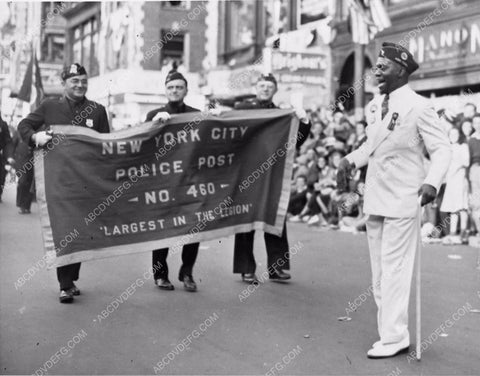 candid Bill Robinson marches in parade all day and wears out his feet 5845-05