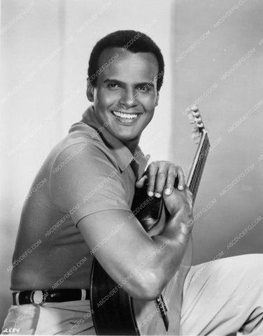 Harry Belafonte portrait with guitar larry semon basketball team ?6032-15