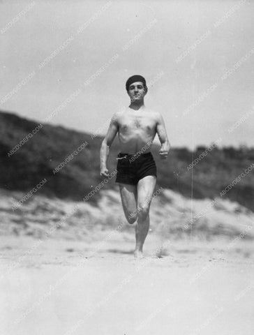 beefcake Ramon Novarro shirtless on the beach 6032-16