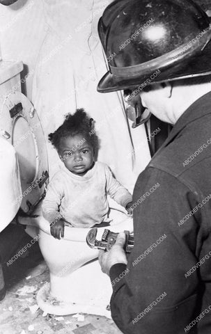 news photo poor baby found in squalor rescued by firemen 6254-25