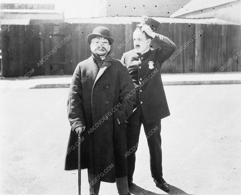 man in mask with street beat cop unknown silent film scene 6522-12
